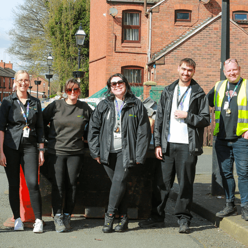 A group of Salix Homes staff out on a street clean-up day
