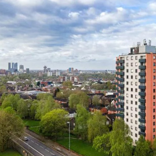 A block of flats overlooking the Salford skyline