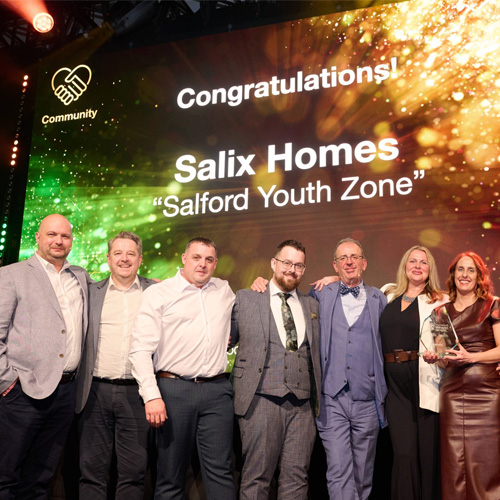 A group of people at an awards ceremony