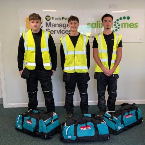 Three young men in hi-vis jackets