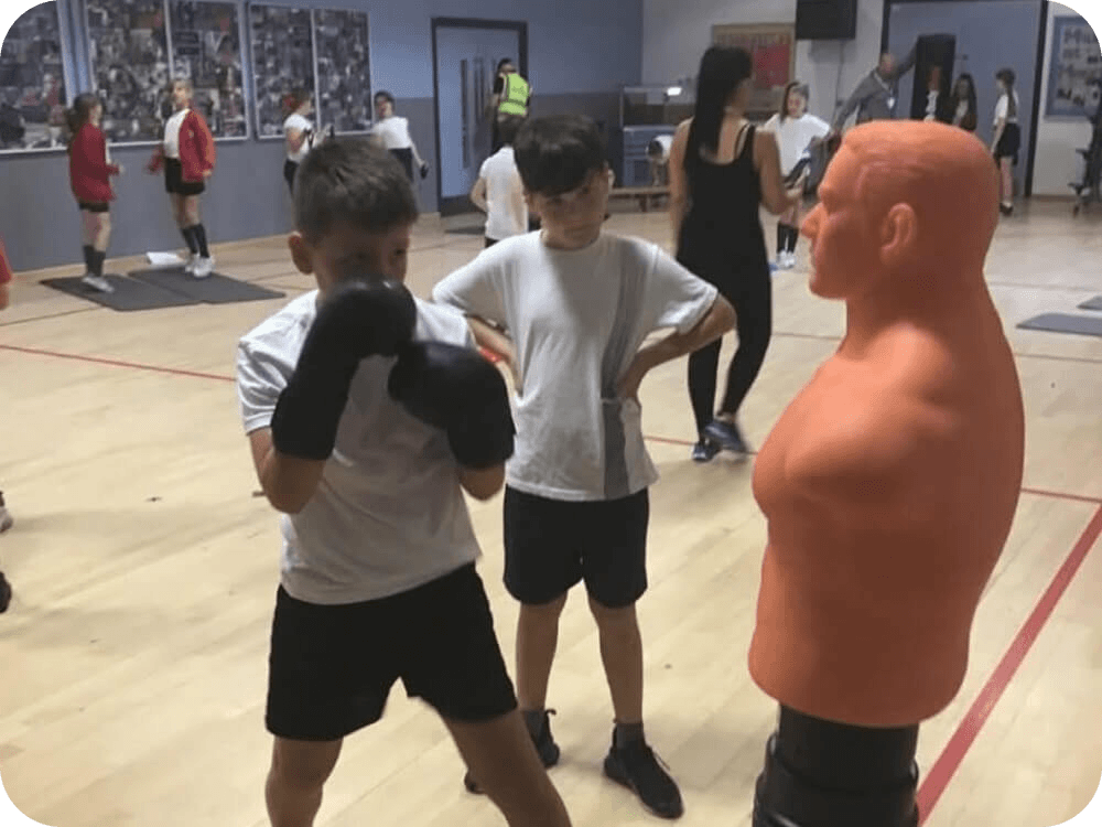 Two boys boxing training